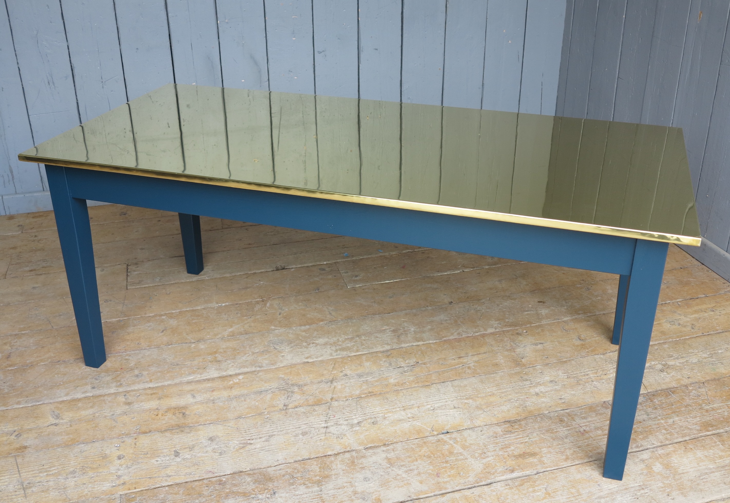 bespoke brass table made by hand at UKAA to individual specifications and requirements. Table base painted in Farrow and Ball Hague Blue.