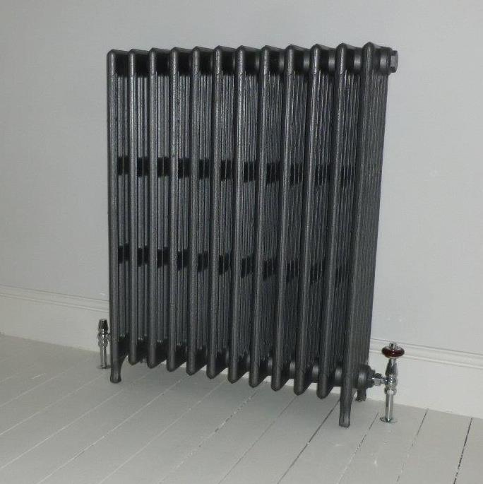cast iron tradition radiator with feet for sale at UKAA painted in Carron foundry grey spray, also a square rear mounted cast iron wall stay and faringdon valve
 