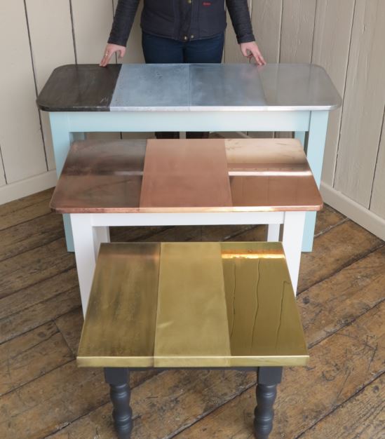 bespoke made to measure hand made metal topped tables for sale at UKAA, including copper, zinc and brass options. Turned tapered and square bases available
