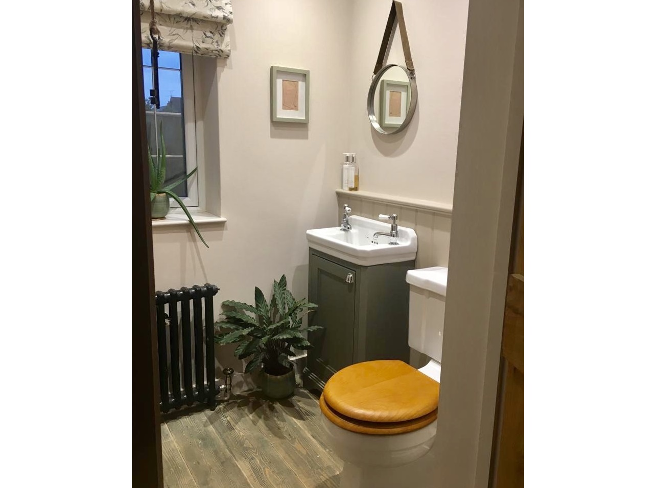 Victorian 2 Column Cast Iron Radiator Fitted in a bathroom.