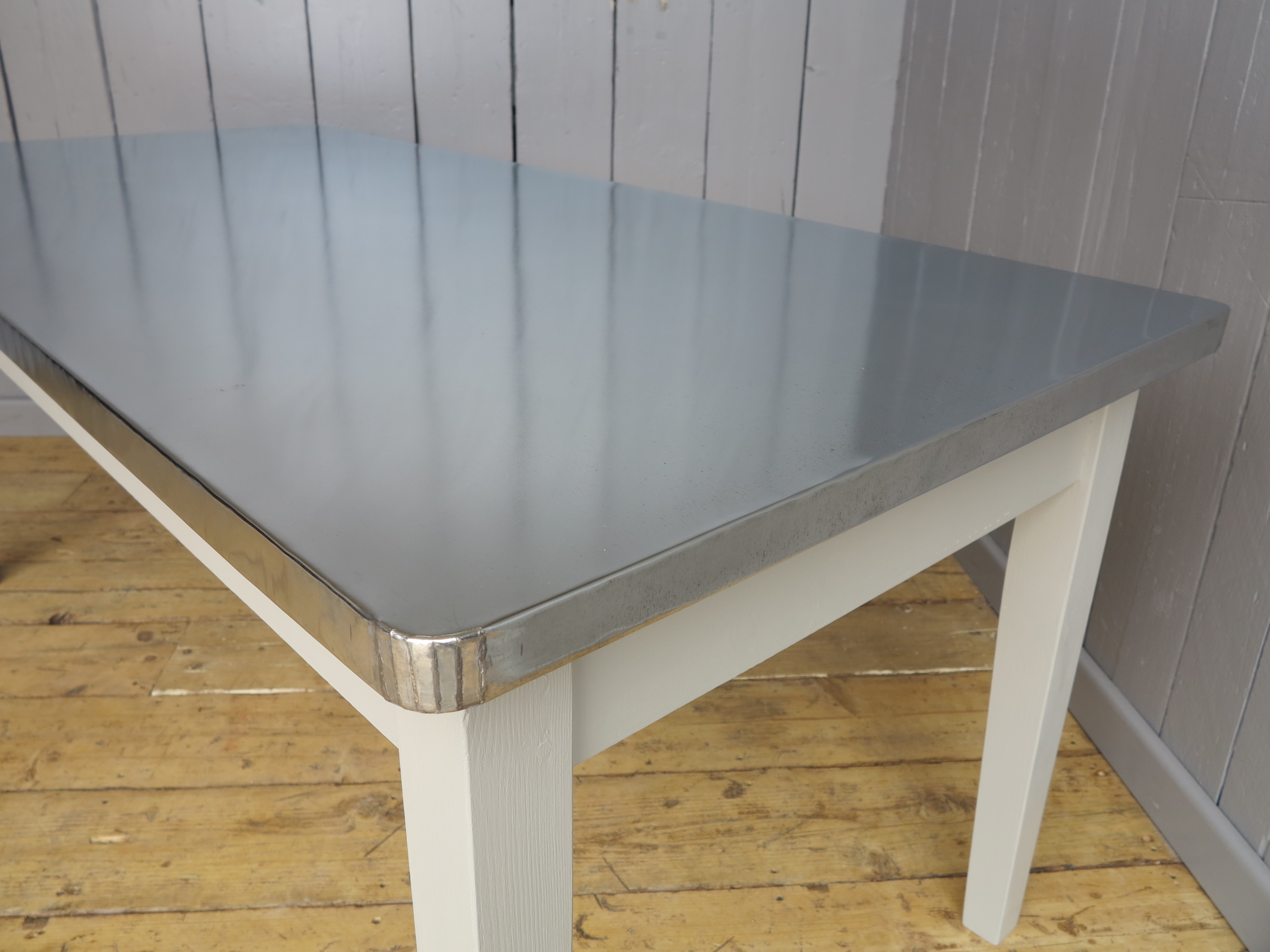 Bespoke Zinc Table with rounded corners on white painted base