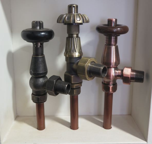 traditional trv radiators valves for cast iron radiators in antique brass, brass or pewter with real wooden heads and flower designs for column radiators 