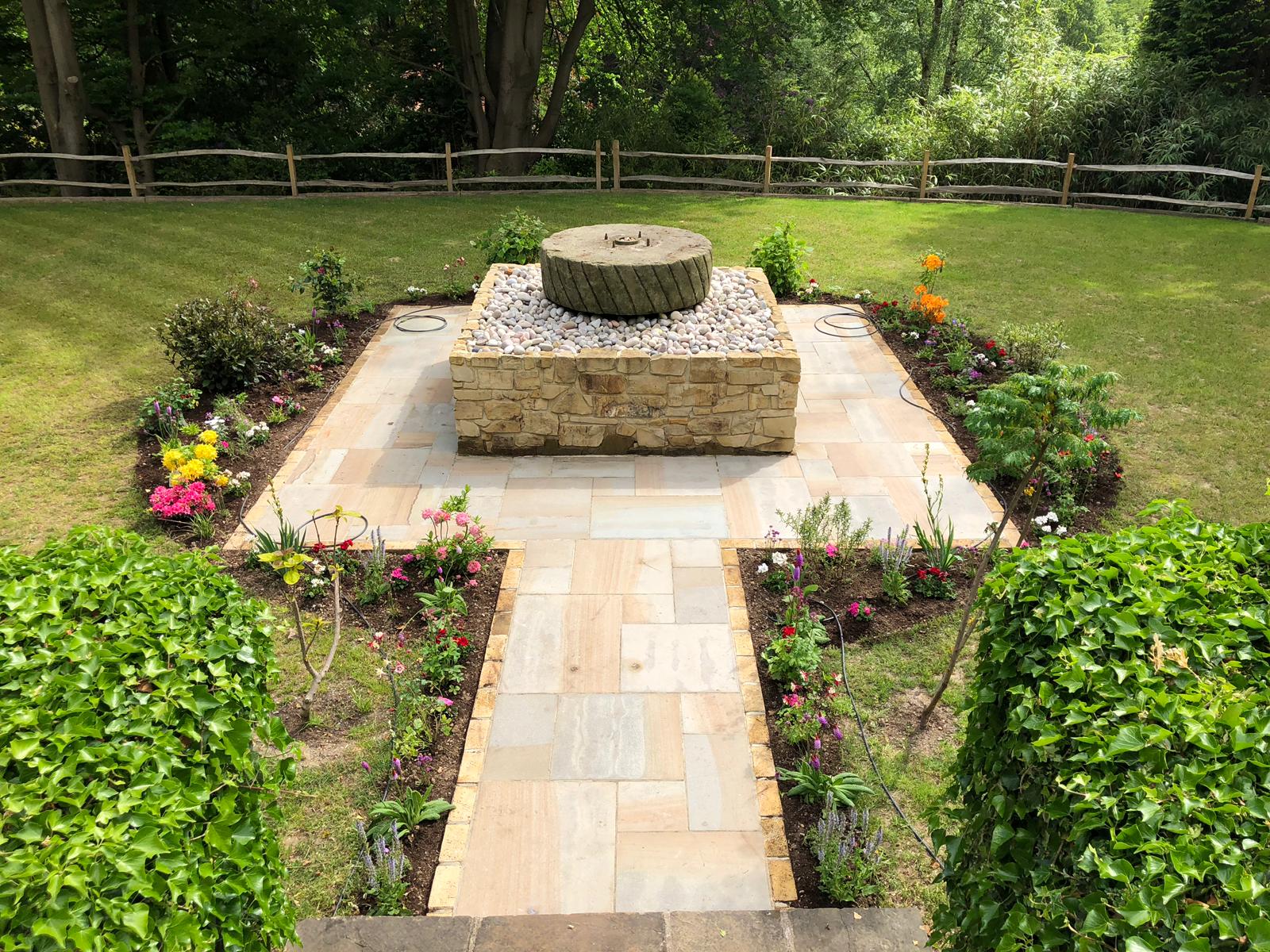 Antique Mill Stone converted to a water feature in a happy customers home