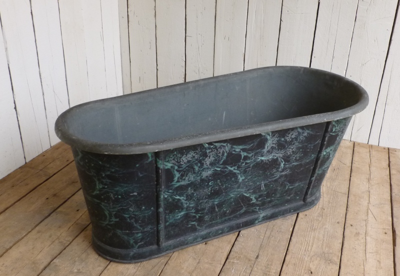 Antique reclaimed Bateau or boat bath salvaged from properties within the UK fully refurbished in our workshops and available for delivery worldwide