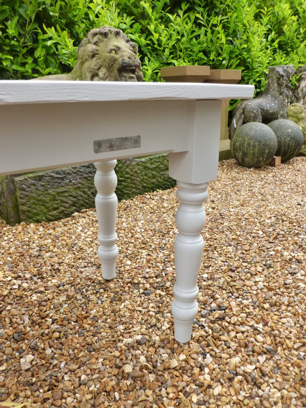 Hand painted
            plank topped table and base with galvanised label