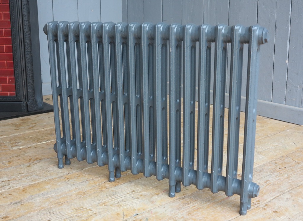 Reproduction New Victorian Style cast iron column radiators to go in a primer finish, in stock ready for next day delivery or collected from UKAA.